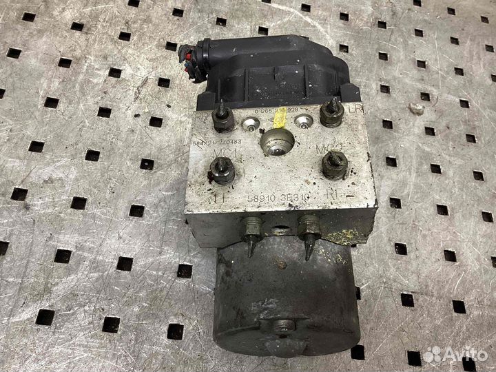 Блок ABS (насос) Kia Sportage