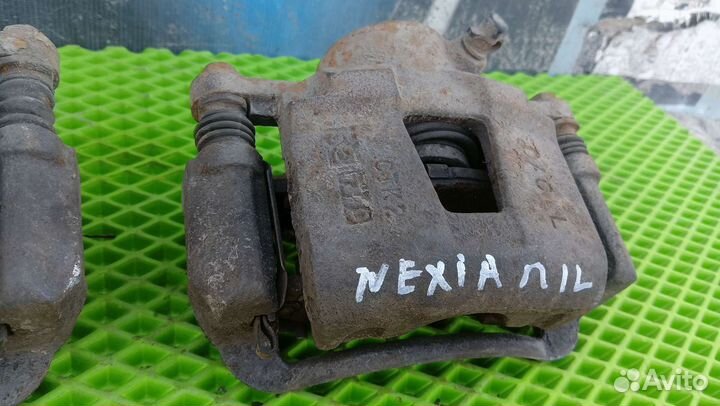 Суппорт тормозной передний Daewoo Nexia 1995- 2008