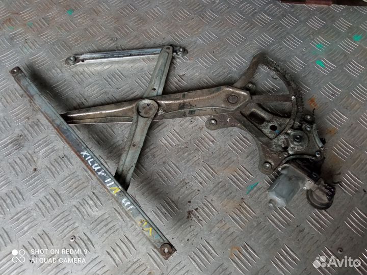 Стеклоподъёмник передний левый Toyota Hilux 7