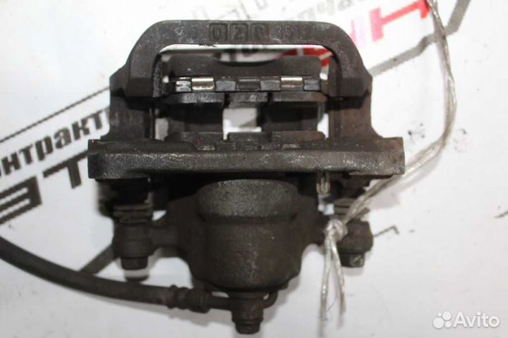 Суппорт В сборе nissan primera X-trail NT30 PNT30