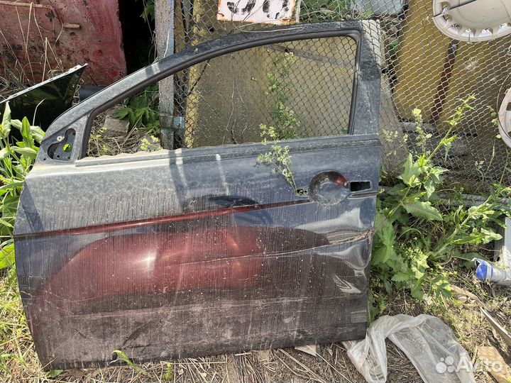 Предняя левая дверь лансер 10