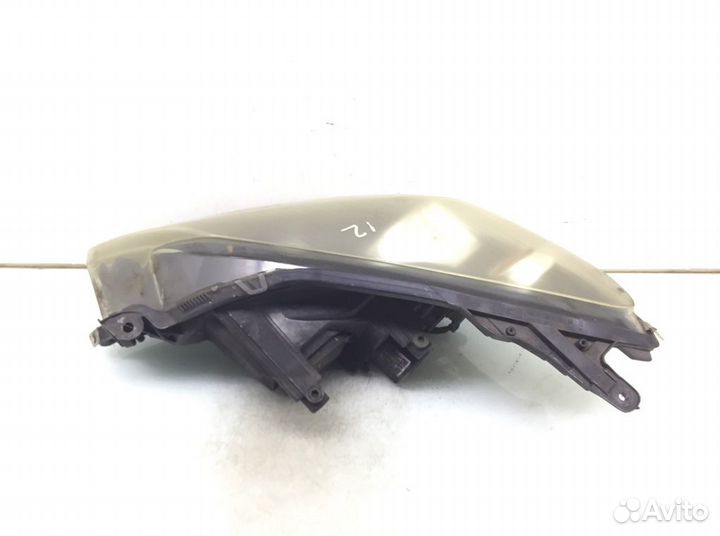 Фара 24451031 Opel Astra H (2004-2010)