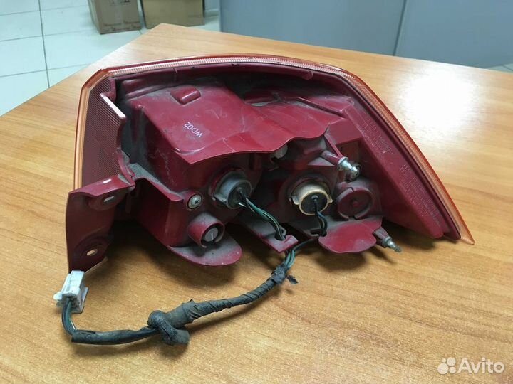 Фонарь задний левый в крыло Lancer X дорест