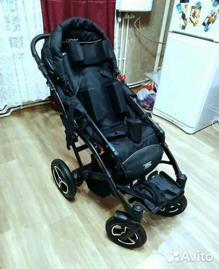 Детская инвалидная коляска