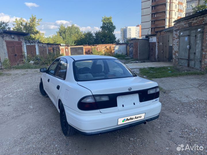 Mazda Familia 1.5 AT, 1997, 367 000 км