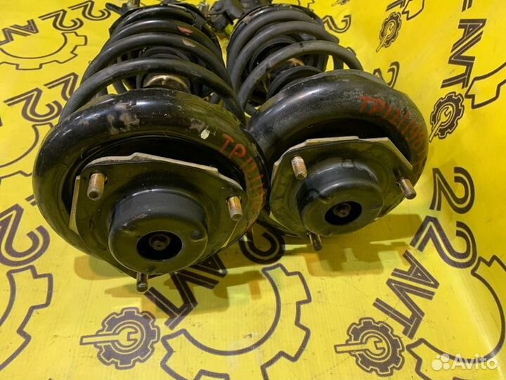 Стойки комплект передние Nissan Primera TP12