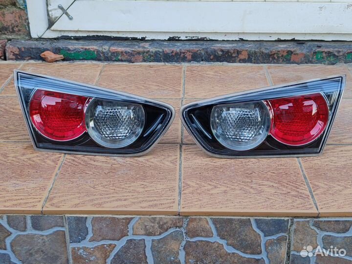 Фонарь крышки багажника lancer 10