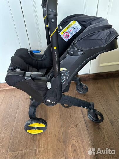 Коляска автокресло doona