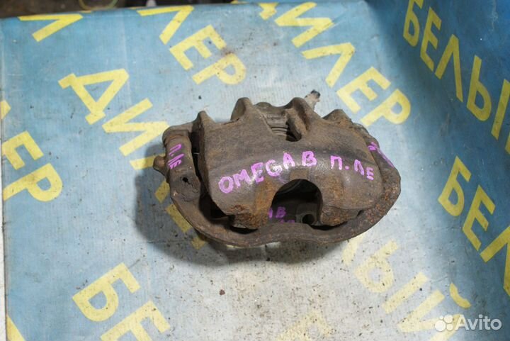 Суппорт тормозной передний Opel omega B