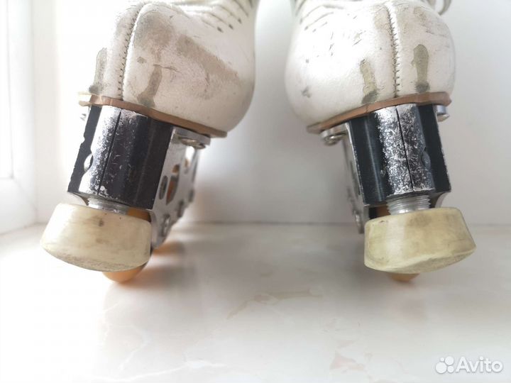 Роликовые коньки