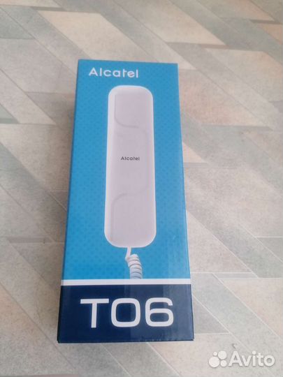 Телефон проводной Alkatel T06, новый
