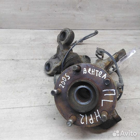 Кулак поворотный передний левый Nissan Primera P12