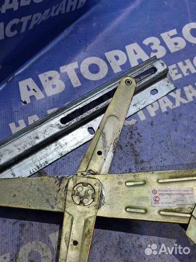 Передний левый стеклоподъемник Газ Волга 31105
