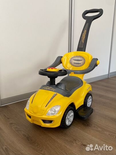 Машинка каталка толокар с ручкой