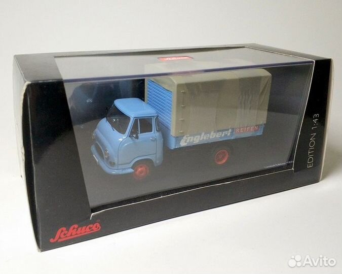 Hanomag Kurier бортовой с тентом Schuco Б.2780