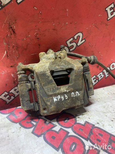 Суппорт тормозной передний левый Chevrolet Cruze 1