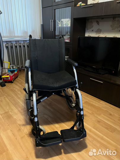Инвалидная коляска