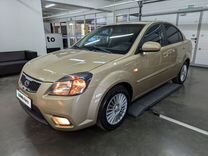 Kia Rio 1.4 AT, 2010, 201 174 км, с пробегом, цена 699 000 руб.