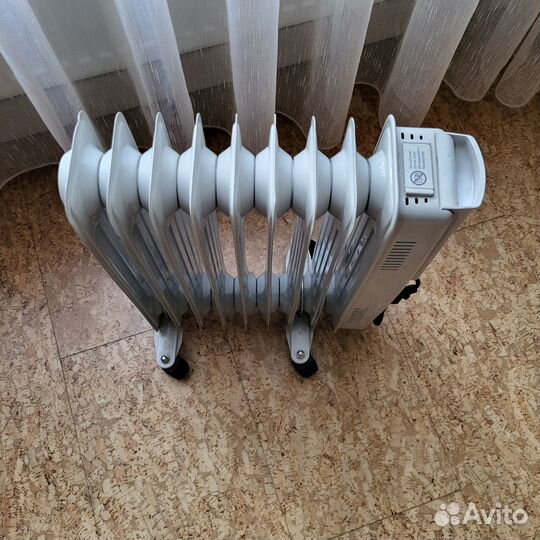 Масляный обогреватель Ravanson OH-09