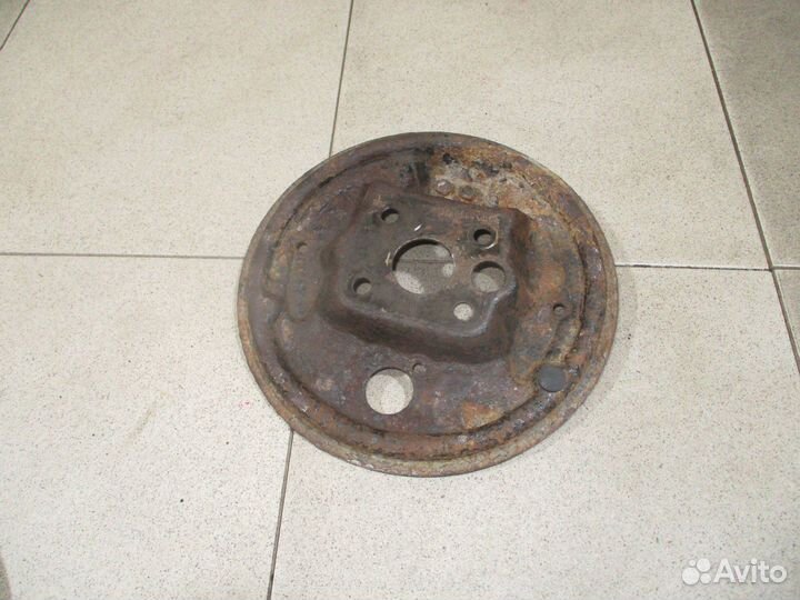 Щит опорный задний левый Chevrolet Aveo (T250)