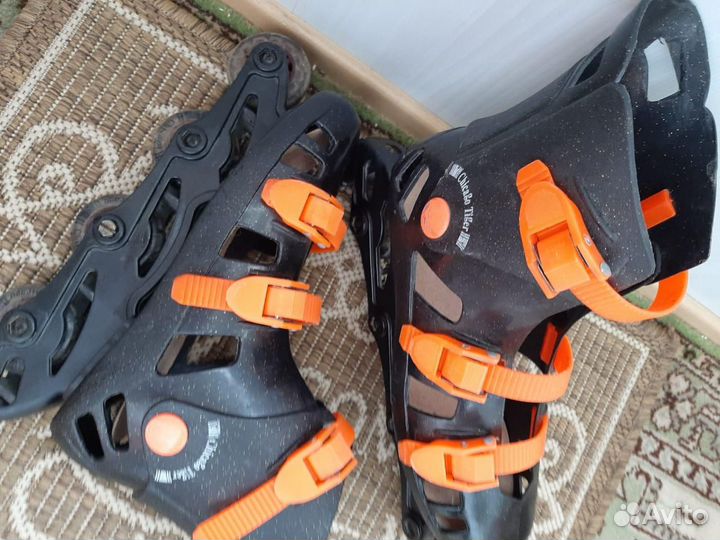 Роликовые коньки