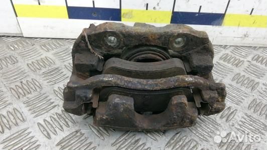 Суппорт тормозной передний левый citroen C3 picass