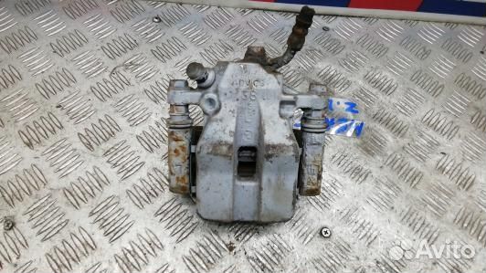 Суппорт тормозной задний левый toyota RAV 4 ZSA3