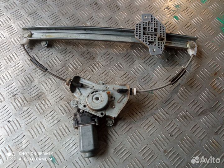 Стеклоподъемник передний левый Киа Рио 3