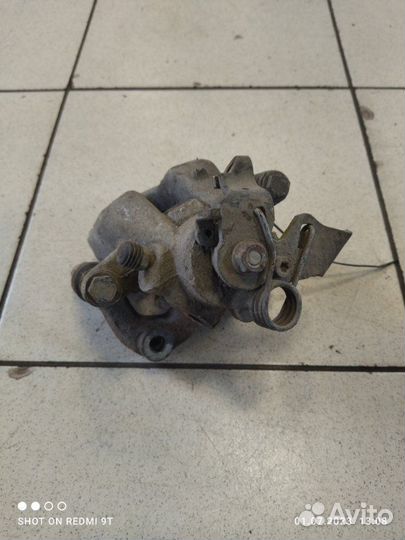 Суппорт тормозной задний правый Peugeot 308