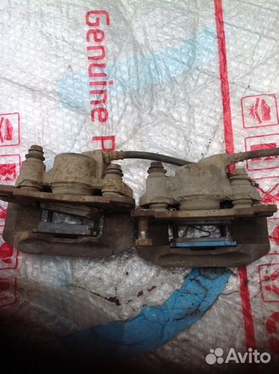 Mitsubishi Pajero sport 1 суппорт задний левый