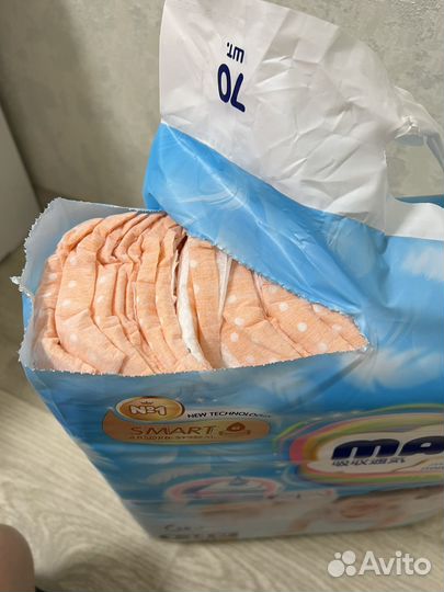 Новая целая пачка подгузников manu L