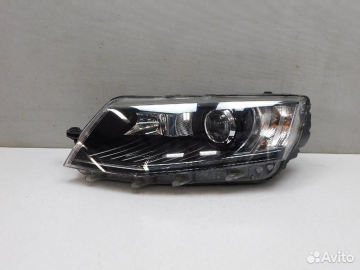Фара левая Skoda Octavia
