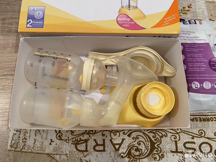 Ручной молокоотсос / Пакеты для хранения молока