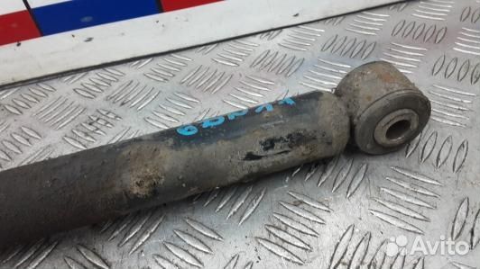 Амортизатор задней балки nissan note E11 (6DN11LX0