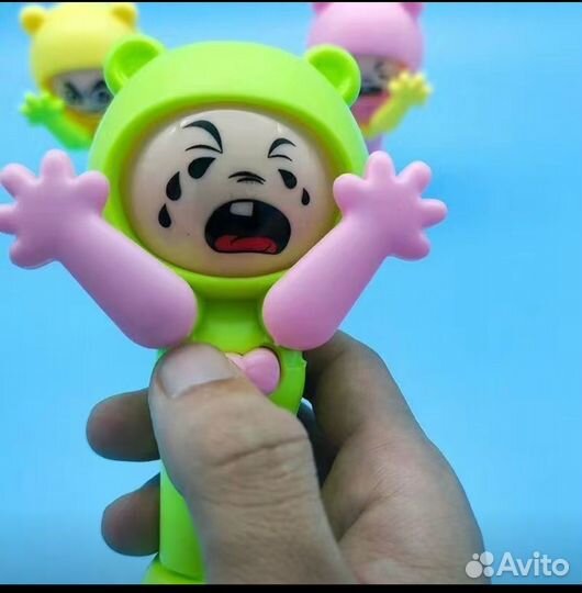 Игрушка, меняющие при нажатии,выражение лица