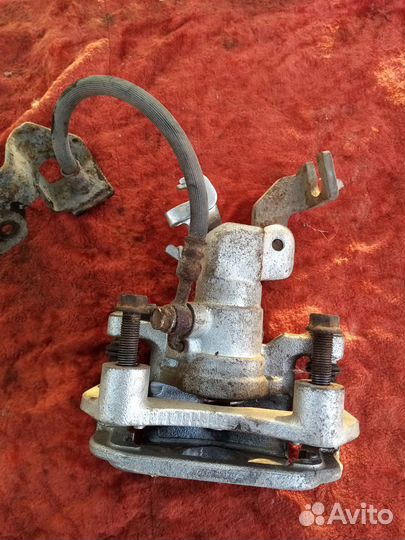 Суппорт задний левый Mazda 6GG