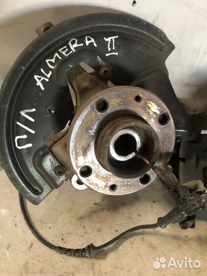 Кулак передний левый водительский Almera G15