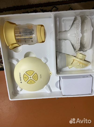 Молокоотсос medela электрический