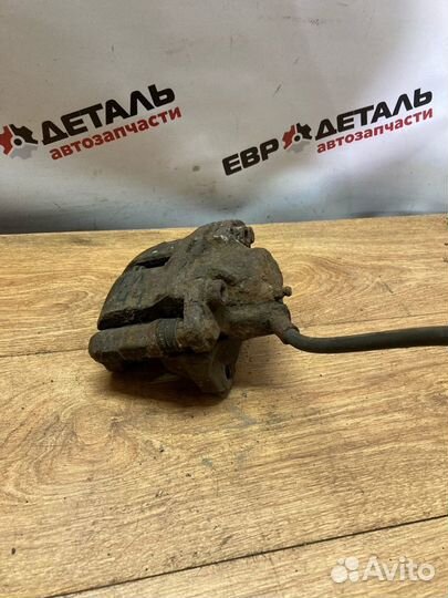 Суппорт тормозной передний левый Logan