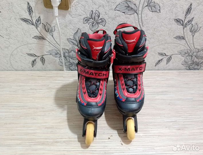 Роликовые коньки