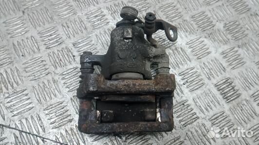 Суппорт тормозной задний левый KIA venga 1, Номер 583001P300, 583101PA30 (8NK12LS01)