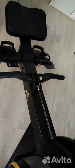 Гребной тренажер