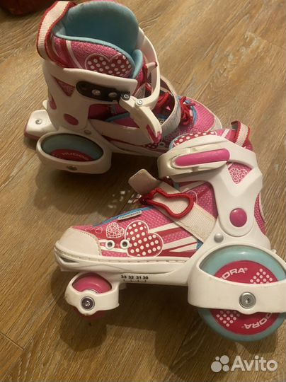 Роликовые коньки