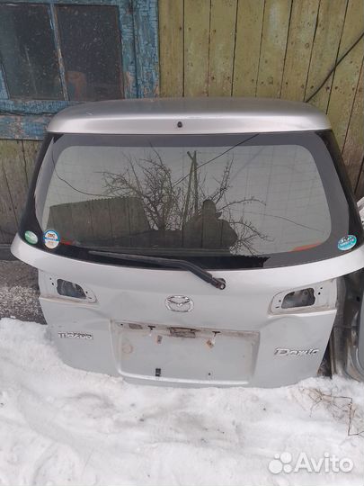 Дверь задняя Мазда демио 2005г