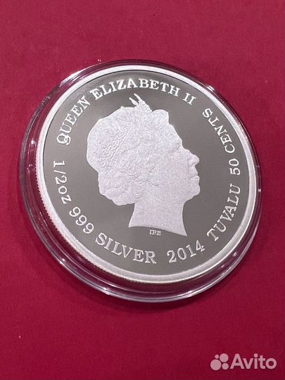 Серебрянная монета 50 центов