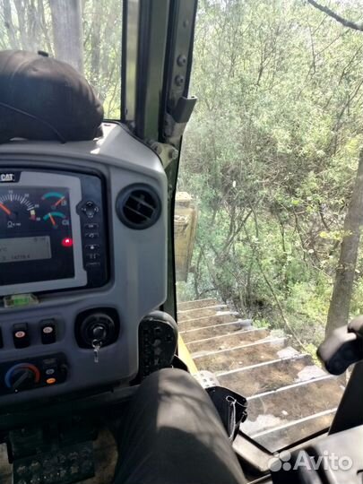 Машинист бульдозера