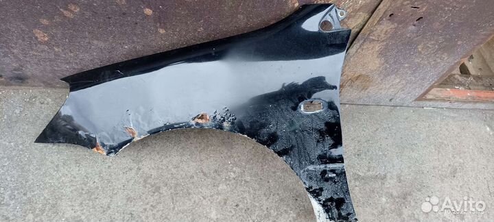 Крыло переднее левое lancer 9