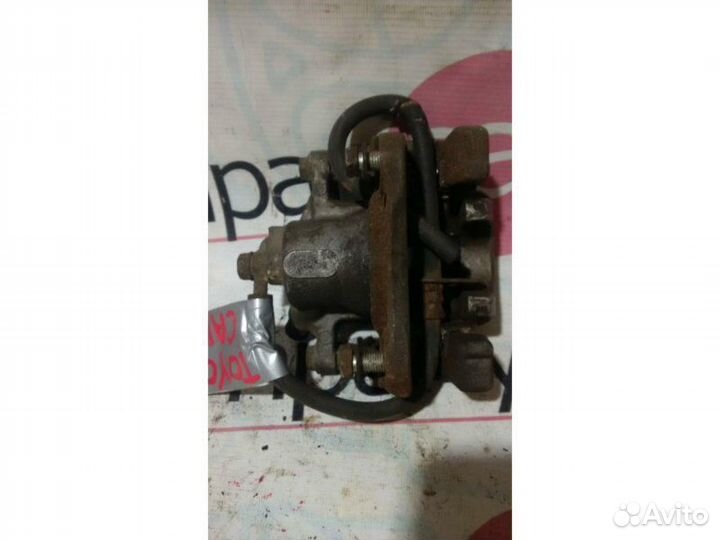 Суппорт тормозной задний правый Toyota Camry V40