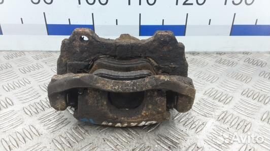 Суппорт тормозной передний левый opel corsa D (NNI