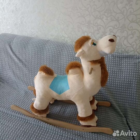 Детская игрушка качалка